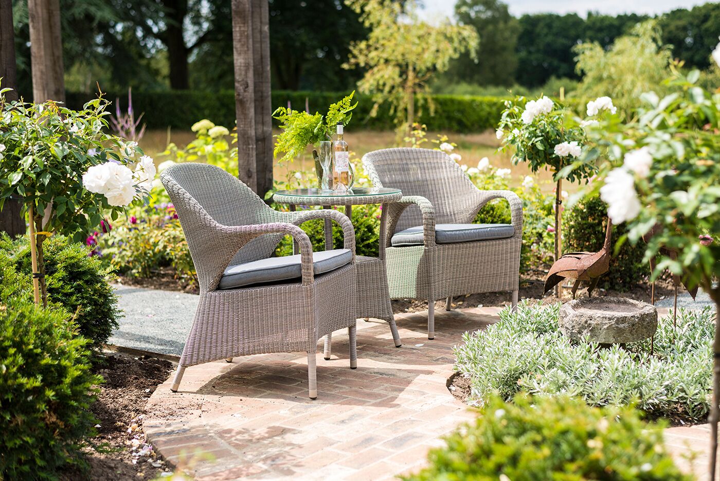 4 Seasons Outdoor Sussex Armchair Bistro Set in Polyloom Pebble Weave